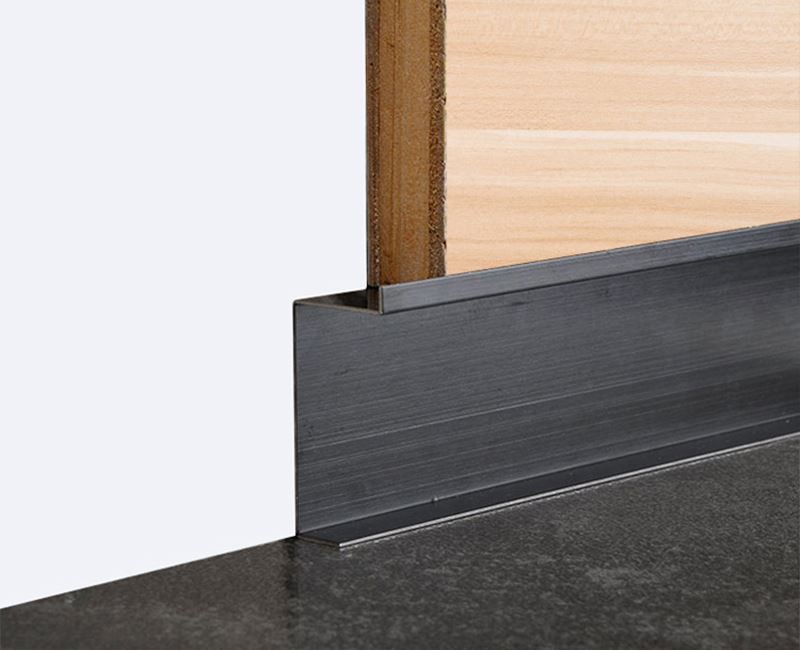 6. stainless skirting board on stone wall