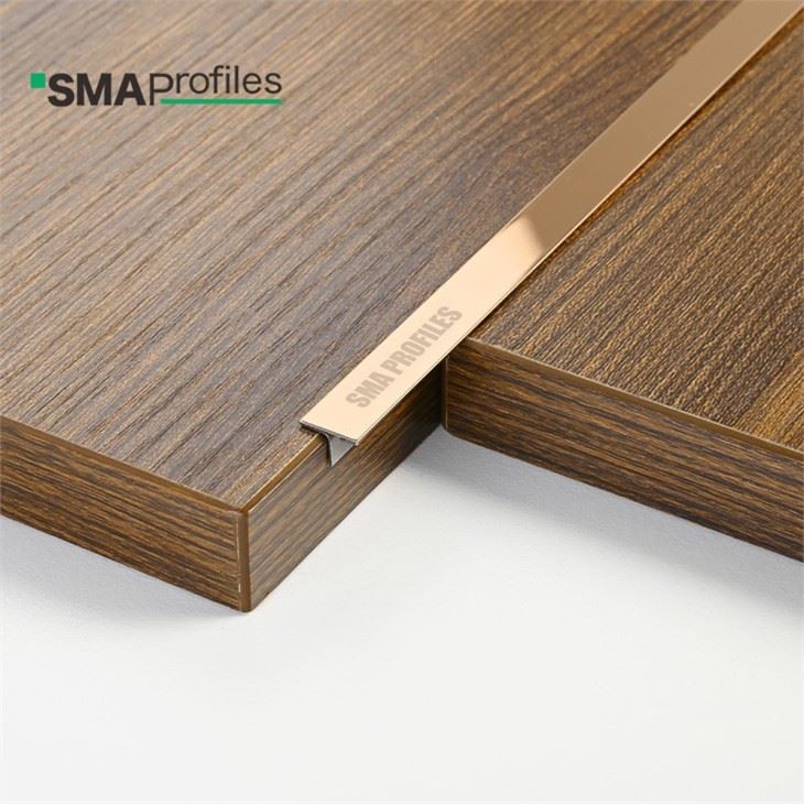 Rose gold T shape tile trim